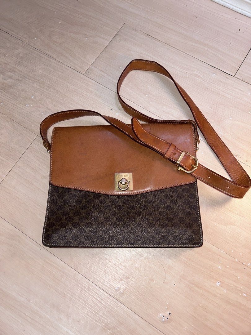 Celine Macadam Brown Monogram Leather Shoulder Bag (Category: Luxury Bags & Wallets) located in Dipolog. Submitted by adrian281994 (Listing ID 1467972089, Image 1). Description: - Brand: Celine - Style: Crossbody bag - Material: Brown Macadam monogram coated canvas with tan leather trim - Hardware: Gold-tone hardware with front Celine clasp closure - Strap: Adjustable shoulder strap - Interior: Divided compartments lined in tan leather, plus an i