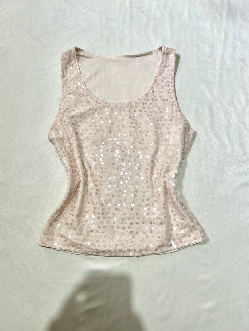champagne sequin scoop tank top (Category: Sleeveless) located in Pagadian. Submitted by yowna_declutters (Listing ID 1467973797, Image 1). Description: dm for more info.