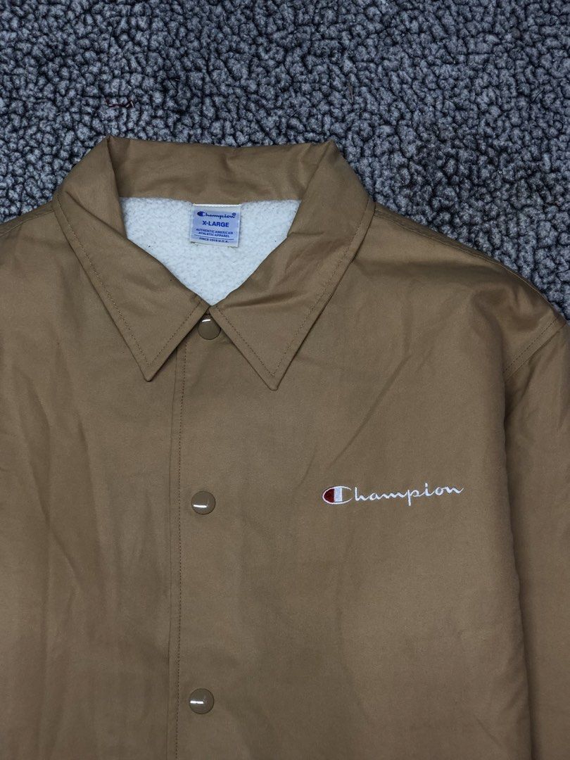Champion Script Coach Jacket (Category: Hoodies) located in Tayabas. Submitted by retro.rags69 (Listing ID 1467846388, Image 2). Description: • Excellent condition • Color rate: 9.5/10 • width: 25 • length: 30 • No Issue • Embroided Logo Design • Sherpa Type • Best Fit: XL.