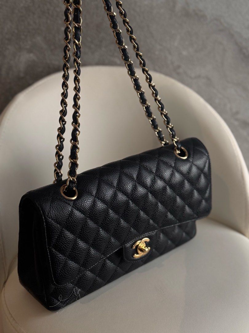 Chanel Classic Medium Flap Caviar Black Gold Hardware (Category: Luxury Bags & Wallets) located in Bacoor. Submitted by iammommylyn (Listing ID 1467895709, Image 3). Description: - Brand: Chanel - Style: Classic Double Flap Medium - Material: Black quilted caviar leather - Hardware: Gold hardware - Condition: Pristine, structured shape with clean corners - Features: Intertwined chain strap for shoulder/crossbody wear, back slip pocket, turn-lock 