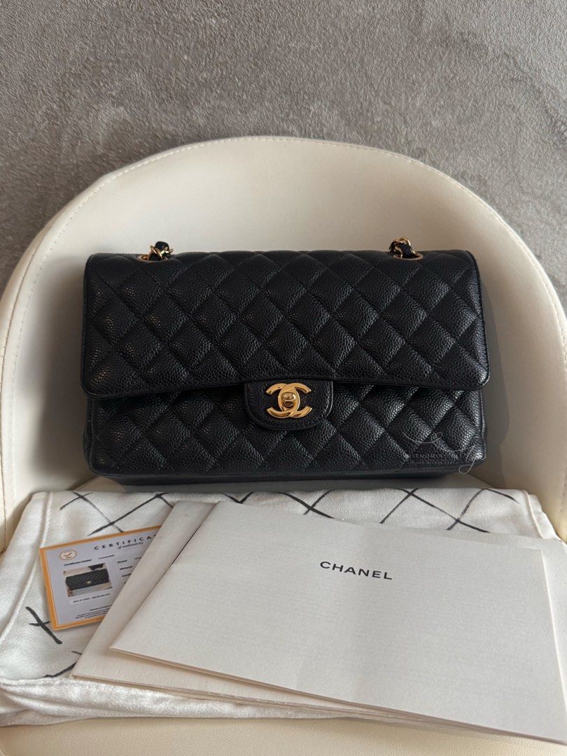 Chanel Classic Medium Flap Caviar Black Gold Hardware (Category: Luxury Bags & Wallets) located in Bacoor. Submitted by iammommylyn (Listing ID 1467895709, Image 1). Description: - Brand: Chanel - Style: Classic Double Flap Medium - Material: Black quilted caviar leather - Hardware: Gold hardware - Condition: Pristine, structured shape with clean corners - Features: Intertwined chain strap for shoulder/crossbody wear, back slip pocket, turn-lock 