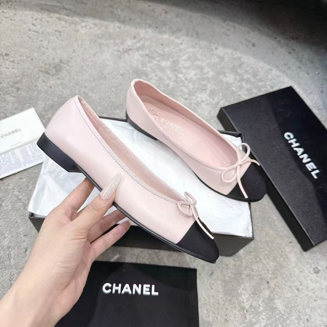 Chanel Pink and Black Cap Toe Ballet Flats (Category: Flats & Sandals) located in Muntinlupa City. Submitted by wassomsalp20437 (Listing ID 1467924942, Image 3). Description: - Brand: Chanel - Style: Classic slip-on ballet flats - Color: Pink leather with contrasting black cap toes - Details: Dainty bow on the front, pink interior lining with stamped CHANEL insole - Inclusions: Original black storage box, dust bag, and paperwork - Condition: Exce