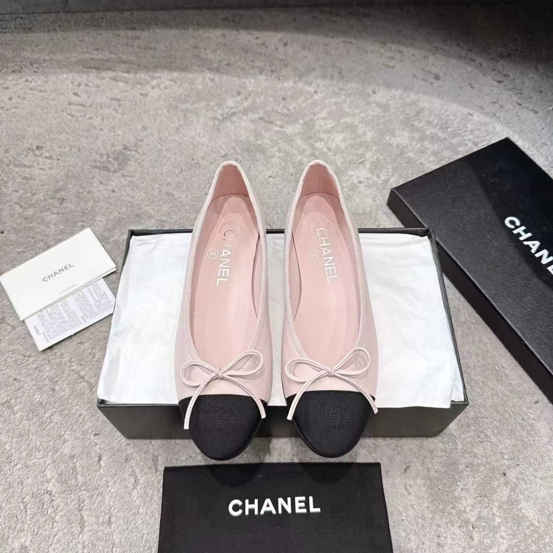 Chanel Pink and Black Cap Toe Ballet Flats (Category: Flats & Sandals) located in Muntinlupa City. Submitted by wassomsalp20437 (Listing ID 1467924942, Image 1). Description: - Brand: Chanel - Style: Classic slip-on ballet flats - Color: Pink leather with contrasting black cap toes - Details: Dainty bow on the front, pink interior lining with stamped CHANEL insole - Inclusions: Original black storage box, dust bag, and paperwork - Condition: Exce