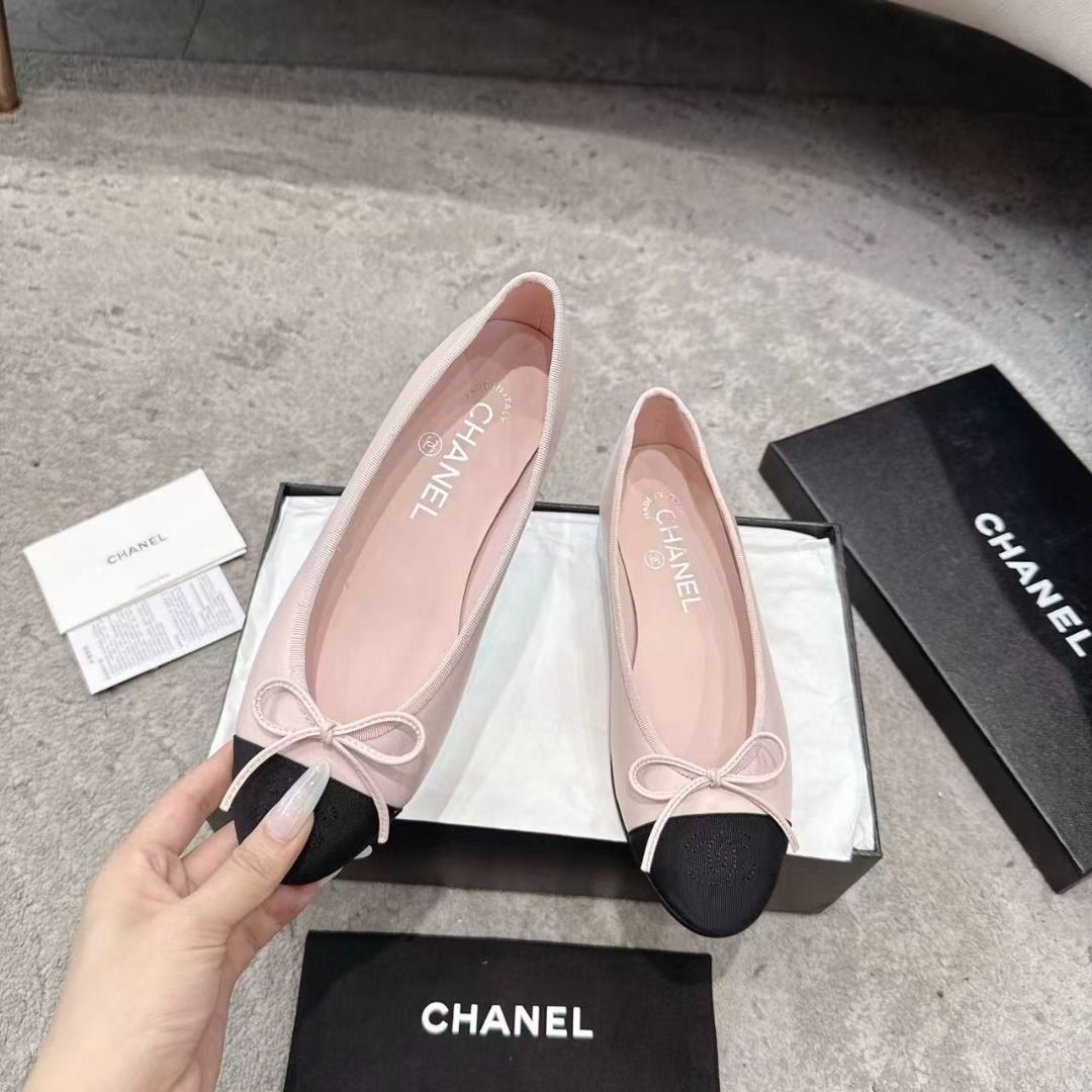 Chanel Pink and Black Cap Toe Ballet Flats (Category: Flats & Sandals) located in Muntinlupa City. Submitted by wassomsalp20437 (Listing ID 1467924942, Image 2). Description: - Brand: Chanel - Style: Classic slip-on ballet flats - Color: Pink leather with contrasting black cap toes - Details: Dainty bow on the front, pink interior lining with stamped CHANEL insole - Inclusions: Original black storage box, dust bag, and paperwork - Condition: Exce