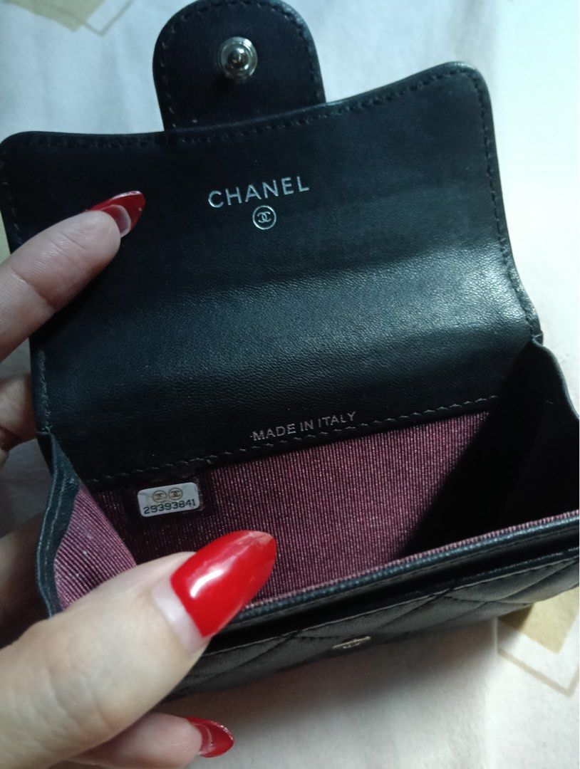 Chanel Quilted Black Leather Key Holder Case (Category: Wallets & Card holders) located in Manila. Submitted by goddesssy (Listing ID 1467840150, Image 2). Description: - Brand: Chanel - Material: Black quilted lambskin leather - Hardware: Silver-tone CC hardware - Interior: Burgundy lining with pocket - Authenticity: Serial sticker reads 29393841, Made in Italy stamp - Closure: Front flap snap closure - Condition: Compact size, normal signs of h