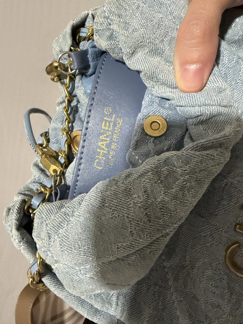 Chanel Quilted Denim Drawstring Bag with Chain Strap (Category: Luxury Bags & Wallets) located in Manila. Submitted by snoopydoopydoo (Listing ID 1467987499, Image 3). Description: - sourced in japan.
