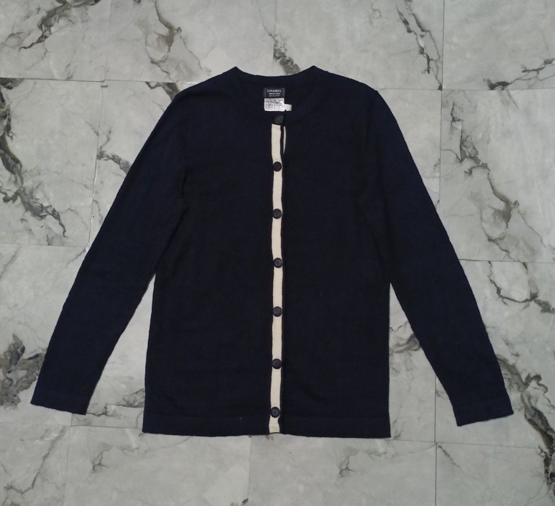 Chanel Uniform Knit Cardigan (Category: Luxury Apparel) located in Bacolod City. Submitted by luxtrend.ph (Listing ID 1467883128, Image 2). Description: Chanel Uniform Knit Cardigan •Photos may vary due to lighting✨ •For Women •Size: Small to Medium can fit •Measurements: 17-18.5W / 25L •Condition: Excellent •Issues: None •Actual Color: Black •Color Rate: 9.8/10 •Complete tags •Stretchable fabric Material •₱rice: 1,880🏷 DM to purchase🛒🛒🛒 Cour