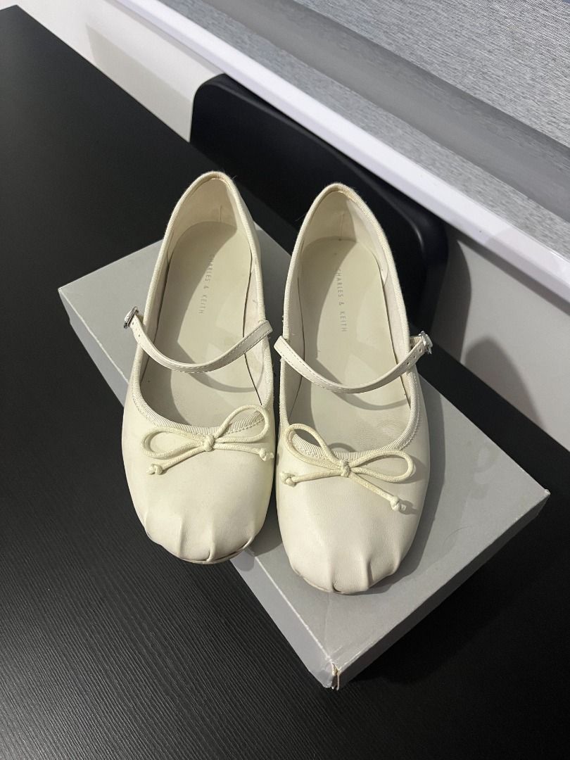 Charles & Keith Bow Mary Jane Flats (Category: Flats & Sandals) located in Las Pinas. Submitted by nastiegal (Listing ID 1467948888, Image 2). Description: Cream satin material mary janes / ballet flats Size 35 Worn What you see is what you get No box / Can provide a c&k box .