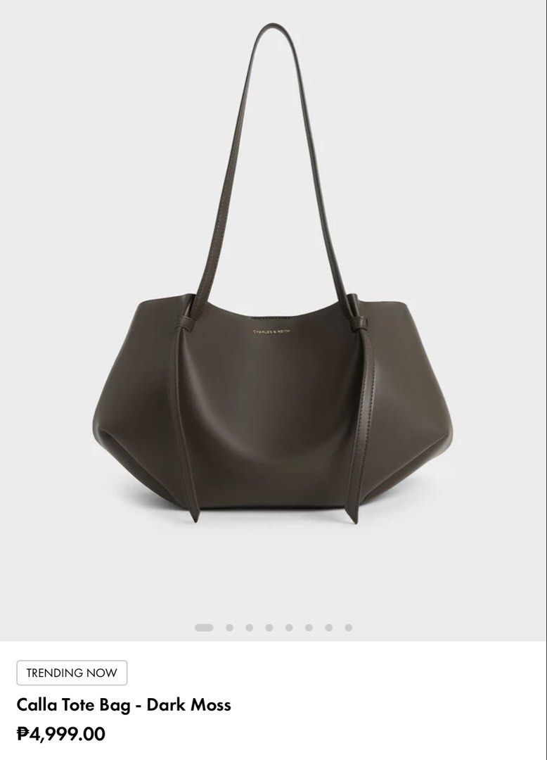 Charles & Keith Calla Tote Bag Dark Moss (Category: Tote Bags) located in Cebu City. Submitted by zarizariii___ (Listing ID 1467903567, Image 1). Description: Decluttering this crowd favorite 😍 Color: Dark Moss Condition: Like new, no issues at all Inclusions: Comes with a small matching pouch First to pay gets the bag 💌 .