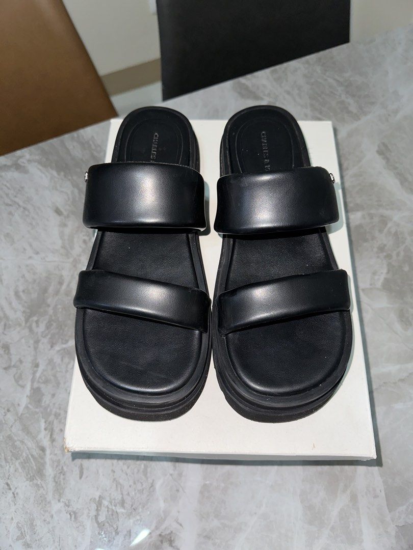 Charles & Keith Double Strap Platform Sandals Black (Category: Flats & Sandals) located in Paranaque City. Submitted by safepenguin_c6a36a (Listing ID 1468000198, Image 1). Description: - Brand: Charles & Keith - Tattie Puffy-Strap Sandals - Color: Black - Style: Double strap chunky platform sandals with a trendy silhouette - Comfort: Super comfortable puffy straps for all-day wear - Versatility: Great everyday footwear that matches almost any ca
