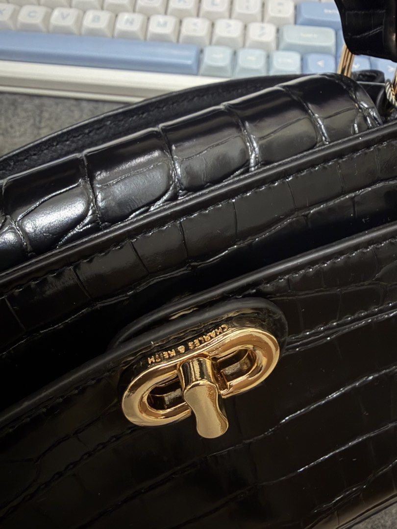 Charles and Keith Aubrielle Croc-Effect Belted Top Handle Bag (Category: Shoulder Bags) located in Bulacan. Submitted by cjhyy (Listing ID 1467922551, Image 2). Description: .