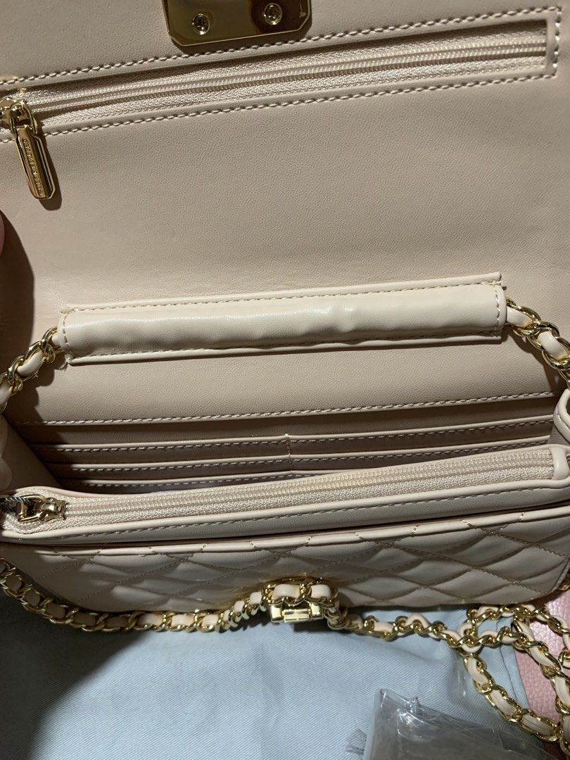 Charles&Keith sling bag/shoulder bag (Category: Shoulder Bags) located in General Trias. Submitted by vpshoppe (Listing ID 1467845046, Image 3). Description: Original Charles&Keith sling bag/shoulder bag brandnew with tag and care card with dust bag small colour:Nude for sure buyer only.