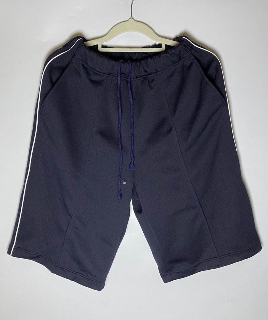 Charolais navy shorts-size M (Category: Shorts) located in Makati City. Submitted by indaysukaycloset (Listing ID 1467902220, Image 1). Description: Charolais Navy Shorts - Size M Details: - Brand: Charolais - Size on tag: M - Color: Navy Blue with white side piping - Condition: Good as new / Like new, - Gender: Unisex Features: - Garterized waist with drawstring (adjustable) - With 2 side pockets - Knee length - Soft dri-fit fabric, light & comf