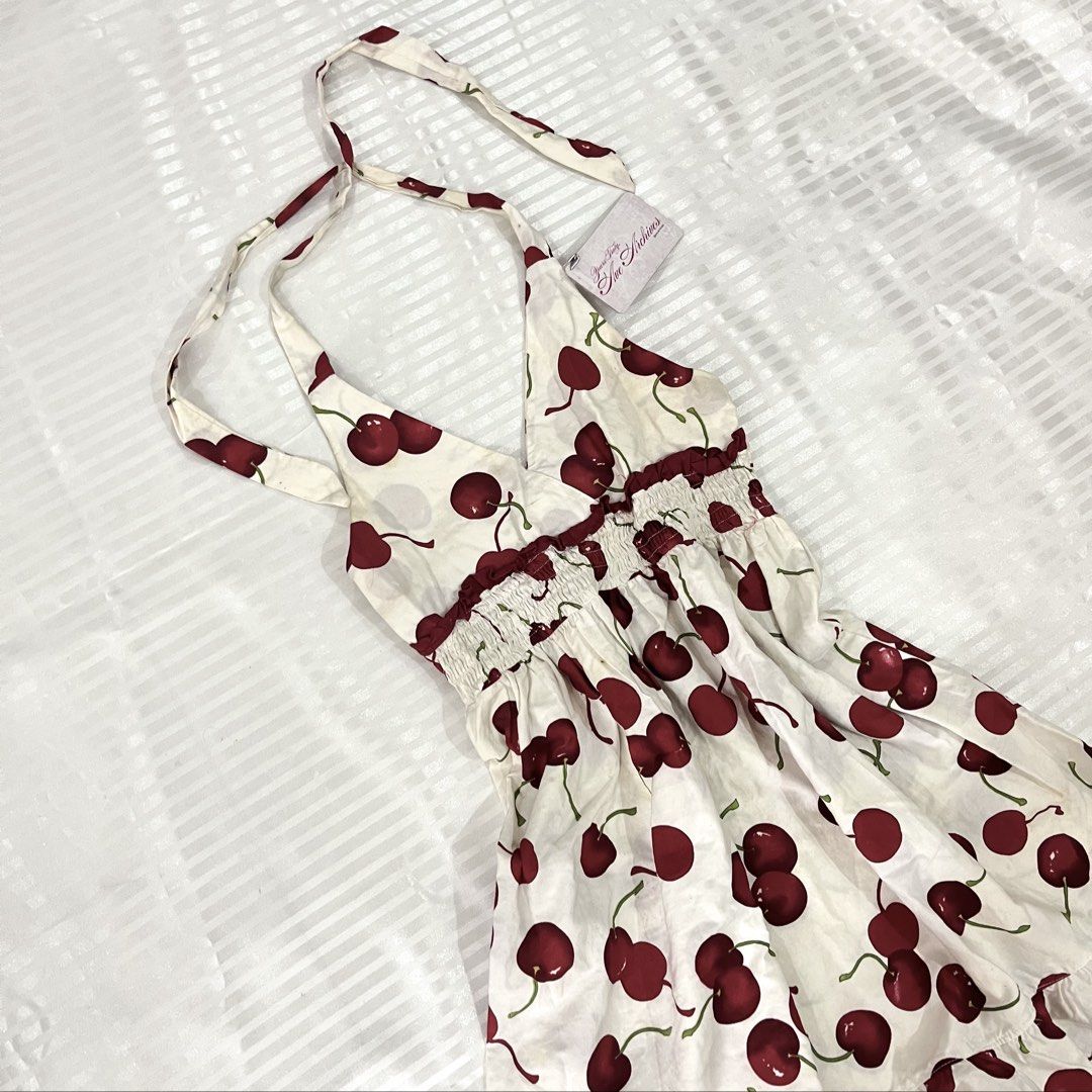 Cherry Smocked Ruffle Mini Doll Dress (Category: Dresses) located in Manila. Submitted by ave.archives (Listing ID 1468015724, Image 2). Description: Cherry Smocked Ruffle Mini Doll Dress 10/10 condition, XS-S.