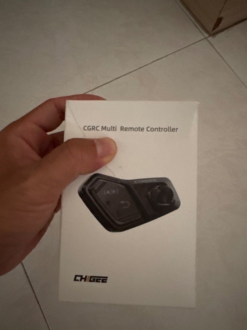Chigee CGRC Multi Remote Controller (Category: Motorcycle Accessories) located in Singapore. Submitted by ja_lim (Listing ID 1467862014, Image 1). Description: - Brand: Chigee CGRC Multi Remote Controller - Condition: Brand new, not used. only opened to check if it fits my bike but unfortunately it doesn’t - Compatibility: Direct control accessory for Chigee smart displays - Features: Handlebar mount for convenient navigation and media controls w