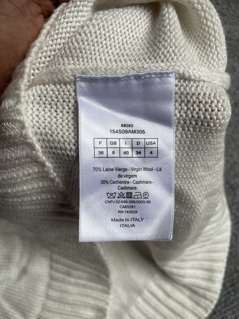 Christian dior knitter blouse (Category: Luxury Apparel) located in Tacloban City. Submitted by solothriftfinds (Listing ID 1467912899, Image 3). Description: Christian dior knitted blouse Good condition.