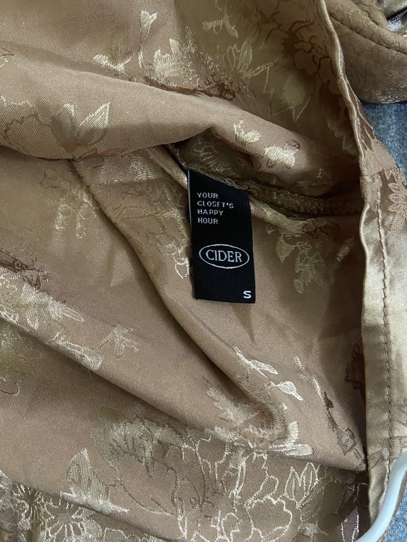 [RUSH SALE] CIDER Champagne Satin Jacquard Ruched Blouse (Category: Blouses) located in Pasig City. Submitted by ellerarissime (Listing ID 1466830719, Image 2). Description: RFS: Decluttering. Size: Small-Medium Sales are negotiable. PM for more item inquiries. Loc: Pasig (Santolan Area).