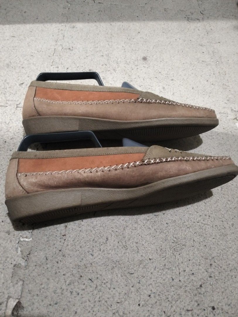 Clarks Womens slip on (Category: Loafers) located in Baguio. Submitted by dapper_deals (Listing ID 1467984052, Image 3). Description: These are Clarks women's slip-on casual shoes or loafers in a tan and pink/coral suede-leather combination with a size of 5 ½ marked on the insole. Leather Upper Lea / Man Made Text Lining Man Made Sole size indicated using tape measure pm me for other details needed.