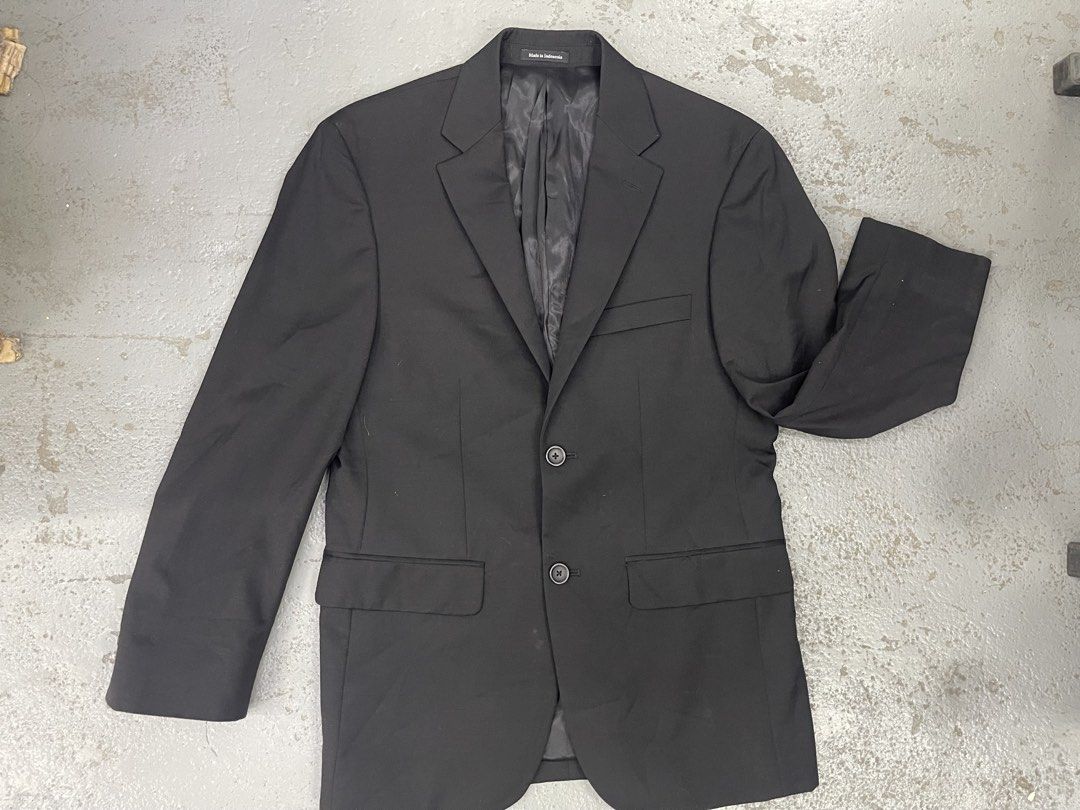 Classic Black Men's Suit Jacket Blazer (Category: Coats, Jackets and Outerwear) located in Bulacan. Submitted by grazcloset (Listing ID 1467889790, Image 1). Description: - Color: Classic black - Closure: Two-button front - Style: Standard notched lapels and front flap pockets - Interior: Fully lined in dark grey fabric - Origin: Made in Indonesia.