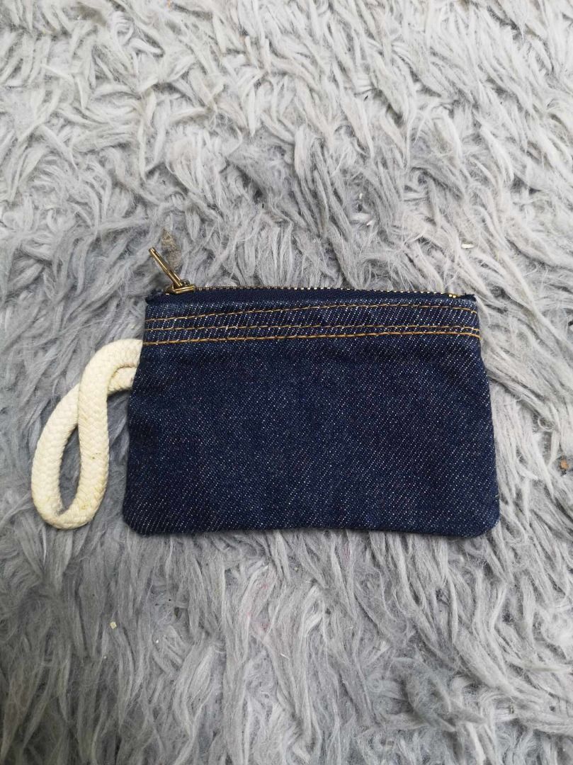 Classic Dark Denim Texture Zipper Pouch (Category: Purses & Pouches) located in Santa Cruz. Submitted by jmy_surplus.2 (Listing ID 1467997497, Image 1). Description: Size ; L - 3.3 W - 5 Color ; Dark Denim Type ; Pouch Brand ; No brand Material ; Synthetic Style ; Zipper Closure With Wrist Strap Pouch LG 116 JMY 3 Batch #225.