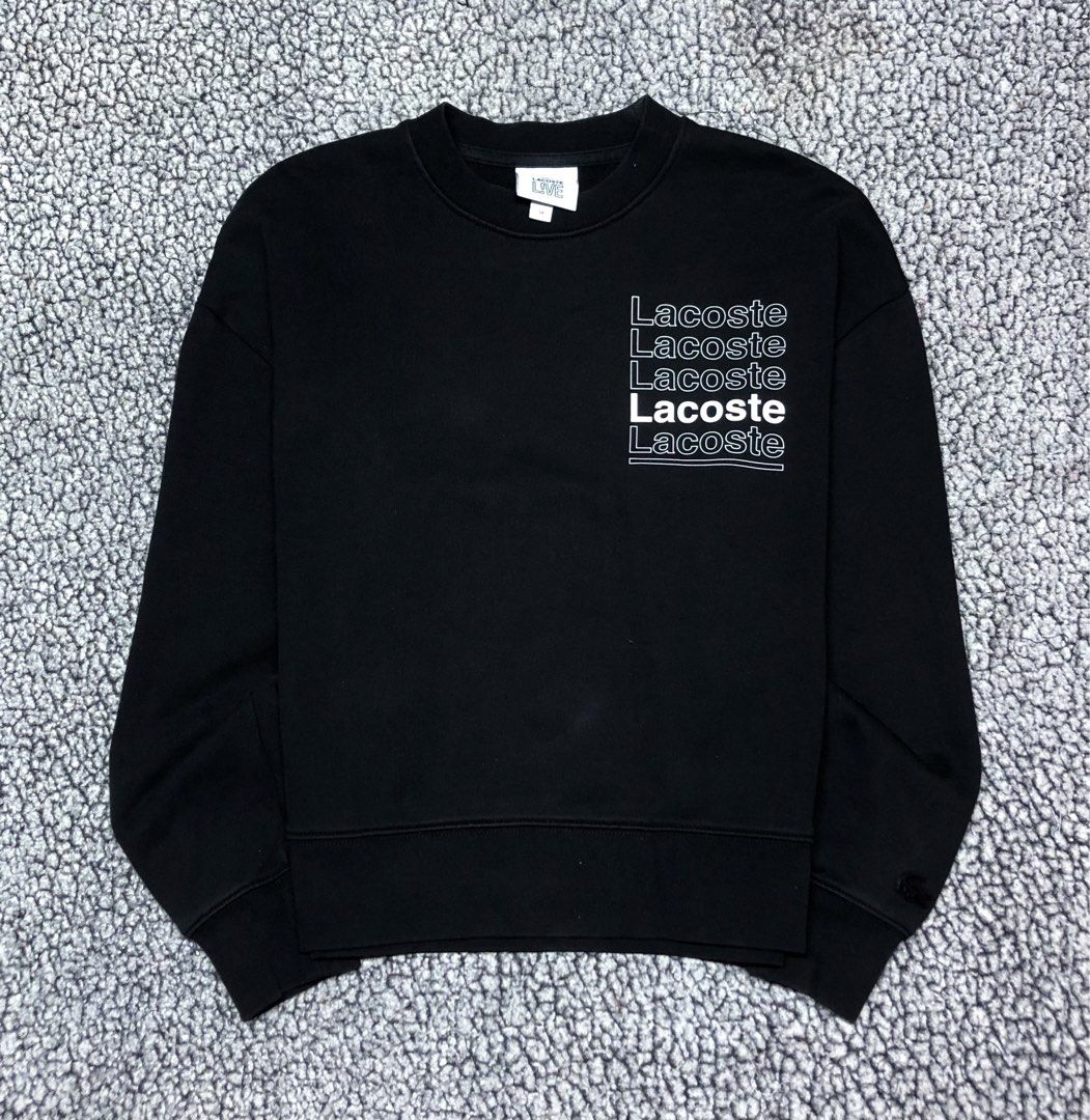 Classic Lacoste Multiple Logo Womens Pullover Sweater (Category: Others Tops) located in Tayabas. Submitted by retro.rags69 (Listing ID 1467846482, Image 1). Description: • Excellent condition • Color rate: 9.5/10 • width: 22 • length: 22 • No Issue • Printed Logo Design • Two-tone Colorway • Solid Backhit Design • Best Fit: S-M.