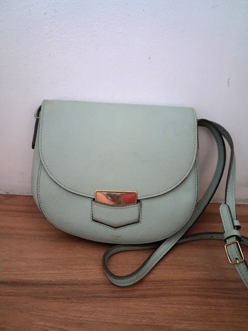 Céline Trotteur (Category: Cross-body Bags) located in Muntinlupa City. Submitted by msshoppingera (Listing ID 1467908682, Image 1). Description: Céline Trotteur crossbody bag by Phoebe Philo. Light green colour. No peeling, no scuffings, no stickiness, no foul smell. Width:7.5 in Height:7.5 in Depth:2 in **Nöt gûaränŧèěđ ąůťĥëŉŧīç All items are available unless marked as sold. Payment first before shipping. Shipping fees will be paid by the buye