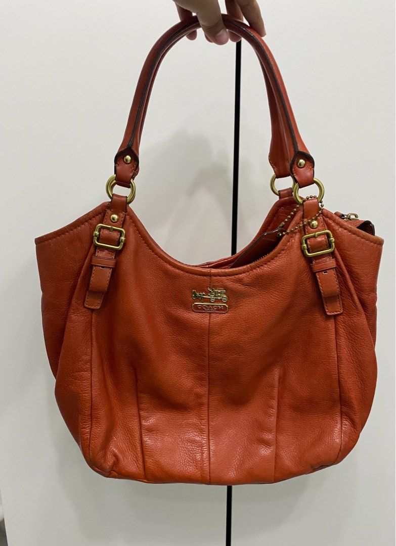Coach and MK bags (Category: Luxury Bags & Wallets) located in Manila. Submitted by nienieniee (Listing ID 1468049005, Image 1). Description: - Coach orange leather bag - MK yellow mustard shoulder bag - Coach peach and black color way handbag All are in good condition and no major flaw!! Rfs: Decluttering.