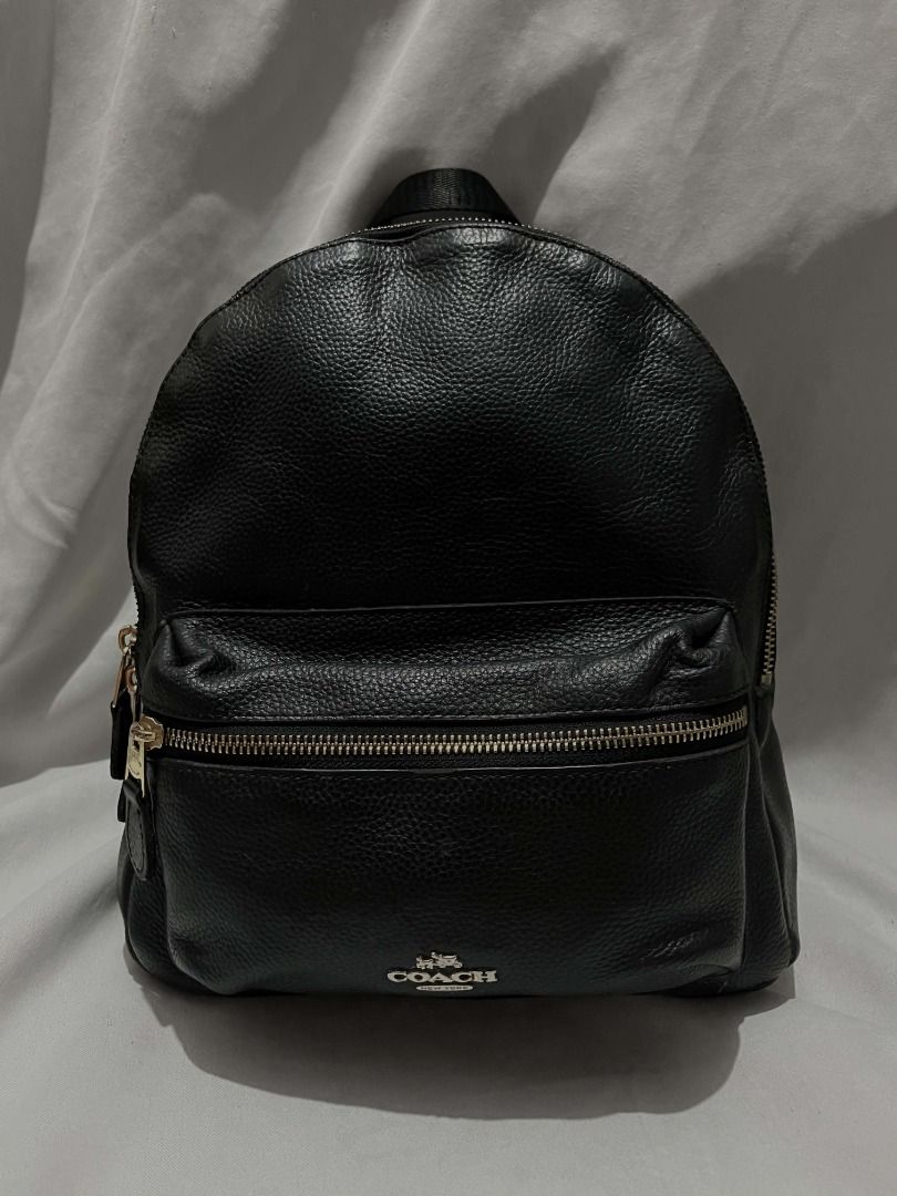Coach Backpack (Category: Backpacks) located in Caloocan City. Submitted by gellaease (Listing ID 1467931657, Image 1). Description: - Color: Sleek black - Material: Textured leather and durable nylon panels - Comfort: Padded shoulder straps with adjustable nylon webbing - Features: Secure top carry handle and two-way zipper closure - Style: Clean stitching, minimalist design, easy to match with any outfit.
