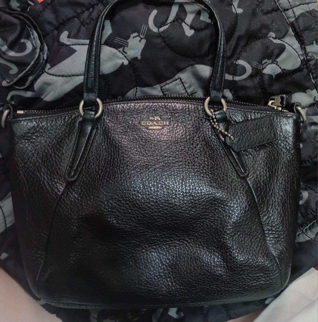 COACH Kelsy leather Small Satchel Bag (Category: Luxury Bags & Wallets) located in Manila. Submitted by eriiicaspage (Listing ID 1451635932, Image 2). Description: PreOwned WellUsed Authentic black Coach Small Kelsy Pebbled grained leather Satchel bag -Small - Made from premium pebbled leather - SecureYKK zip-top closure RePlaced Coach Bag leather hang tag - Comfortable top handles - Detachable shoulder strap for versatile carrying - Interior zip