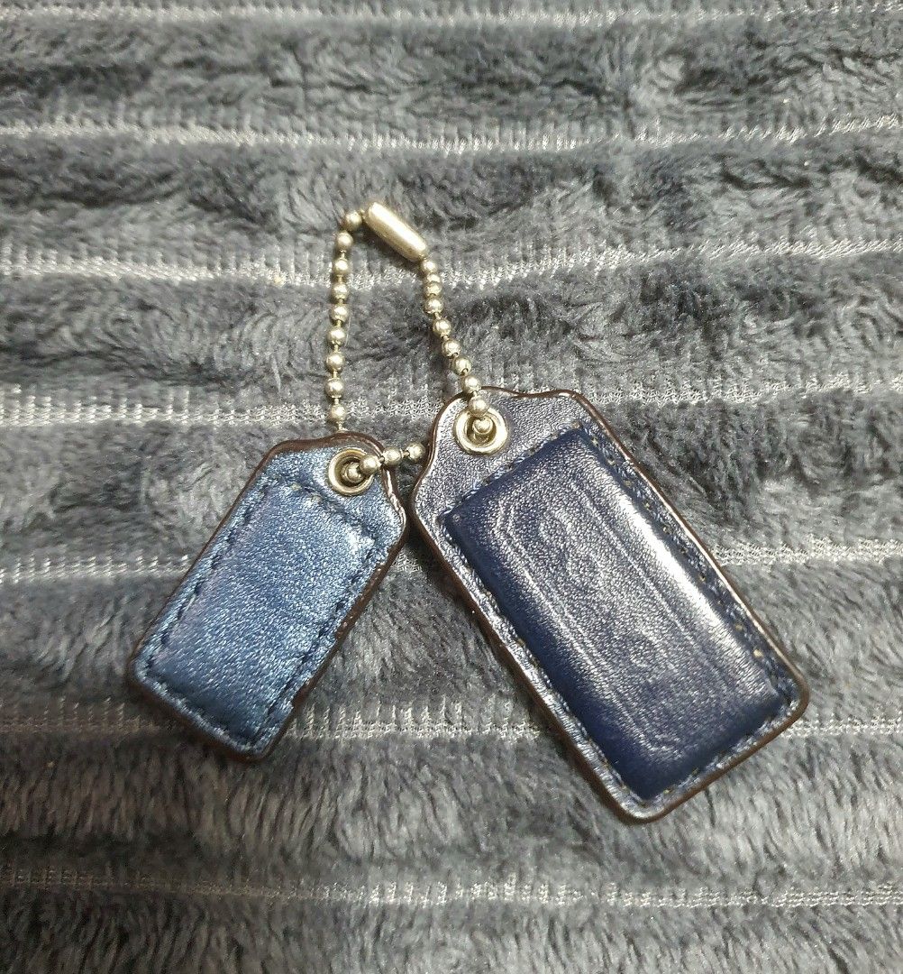 Coach Leather Bag Charms and Hangtags Set (Category: Charms) located in Manila. Submitted by mozaitv1236506 (Listing ID 1467919099, Image 2). Description: - Authentic Coach bag charms and hangtags bundle - Includes black leather turnlock tag and black leather tag with gold horse and carriage logo - Comes with two blue leather hangtags on a metal ball chain - Perfect for customizing and mixing/matching on your favorite handbags or totes - Conditio