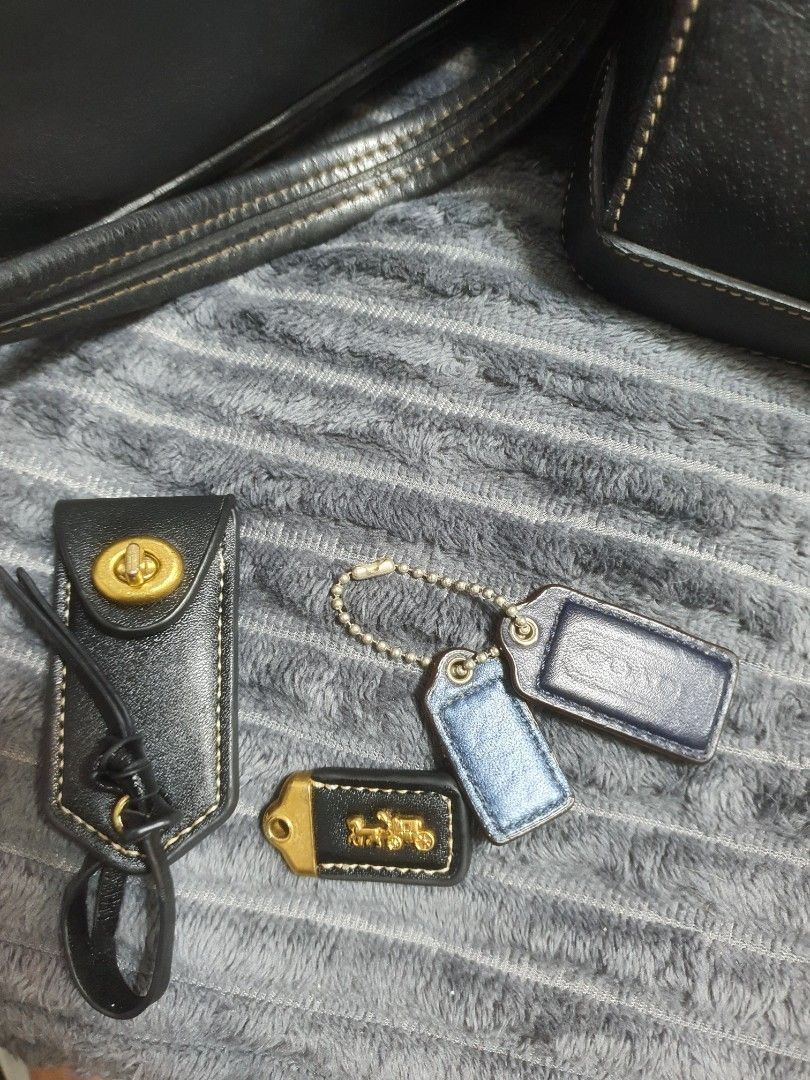 Coach Leather Bag Charms and Hangtags Set (Category: Charms) located in Manila. Submitted by mozaitv1236506 (Listing ID 1467919099, Image 3). Description: - Authentic Coach bag charms and hangtags bundle - Includes black leather turnlock tag and black leather tag with gold horse and carriage logo - Comes with two blue leather hangtags on a metal ball chain - Perfect for customizing and mixing/matching on your favorite handbags or totes - Conditio