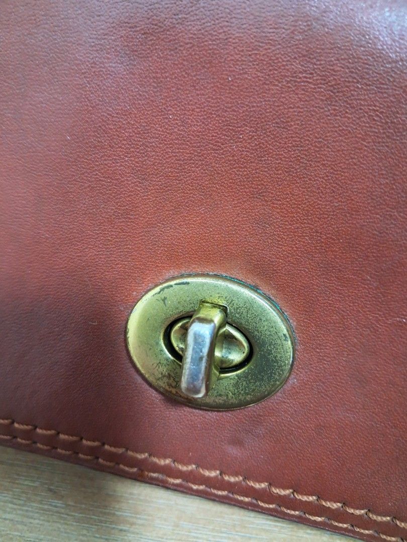 Coach Penny (Category: Luxury Bags & Wallets) located in Muntinlupa City. Submitted by msshoppingera (Listing ID 1467913857, Image 2). Description: Coach leather crossbody bag. Colour tan. Light scratches at the back. No scuffings, no peeling, no stickiness, no foul smell. Measurements: 7.75" (L) x 5" (H) x 2.25" (W) All items are available unless marked as sold. Payment first before shipping. Buyer will pay for shipping. No return No exchange.