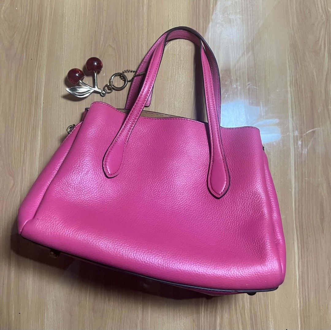 Coach Pink Leather Tote Bag (Category: Shoulder Bags) located in Manila. Submitted by senggggg. (Listing ID 1468028408, Image 3). Description: good condition working zip minimalsign of use and dirt issue check details and size.