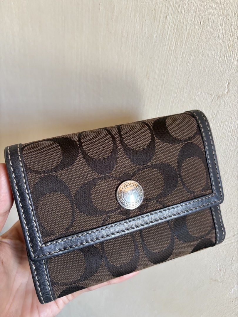 Coach Signature C Choco Brown Canvas Tri-Fold Wallet (Category: Luxury Bags & Wallets) located in Dagupan City. Submitted by beltranmon75535 (Listing ID 1467864078, Image 1). Description: Coach Choco Brown Trifold Wallet 🤎🤎 Normal signs of use Overall in good condition Kindly check each photo for full details Please manage your expectations Location: Dagupan City Add sf Payment first 💸 First to pay basis | No reservations 📩📩.