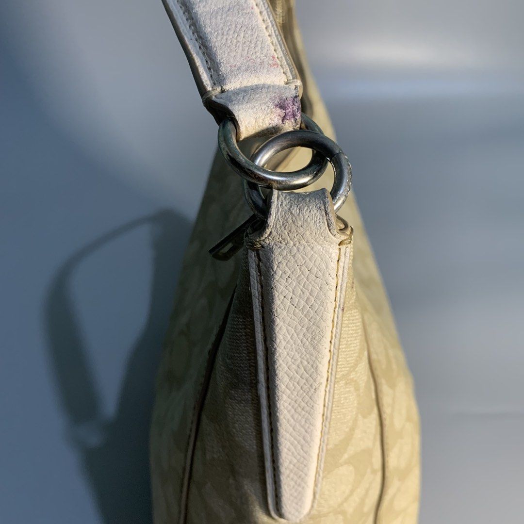 Coach Signature Hobo bag (Category: Luxury Bags & Wallets) located in Davao. Submitted by jandyfuert21303 (Listing ID 1468017830, Image 3). Description: Verygood condition Need minor cleaning only Complete with sling Have signs of usage but presentable to wear.