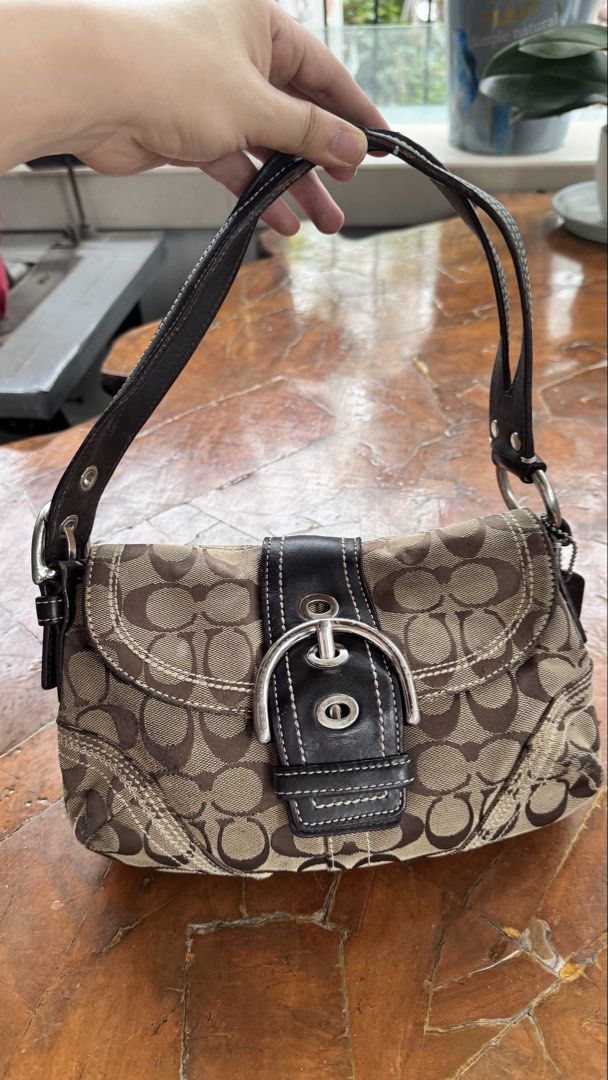Coach Soho Baguette (Category: Luxury Bags & Wallets) located in Tagbilaran City. Submitted by Bunnybebu (Listing ID 1467920238, Image 1). Description: In very good used condition Small size Check all photos for signs of use/minimal flaws Sold as is. What you see is what you get Ask questions before u bid. 📍Tagbilaran City, Bohol ⚠️ This is a thrifted item so please manage your expectations. ❎ Bawal sa maselan at maarte ‼️All sales are final. ‼️