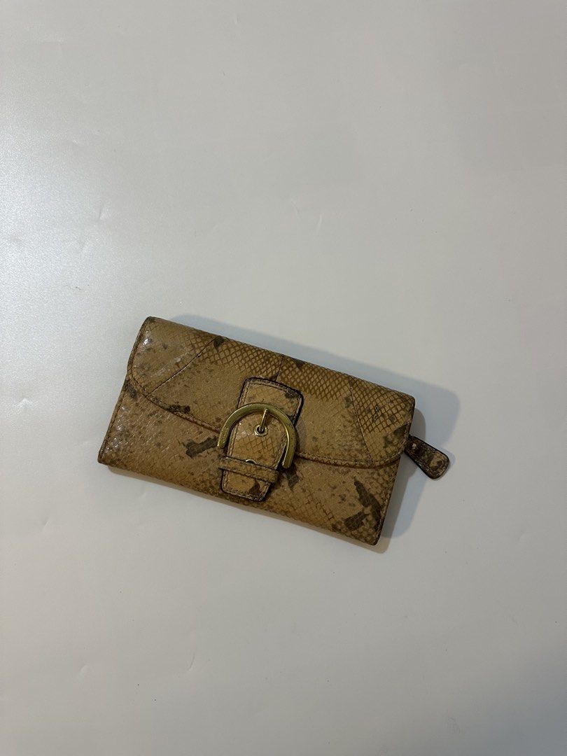 Coach Soho Snakeskin Long Wallet (Category: Other Accessories) located in Bacolod City. Submitted by 2k.archives (Listing ID 1468028317, Image 1). Description: Authentic / Original Rank A Sign Of Usage No Major Flaws Details in picture.