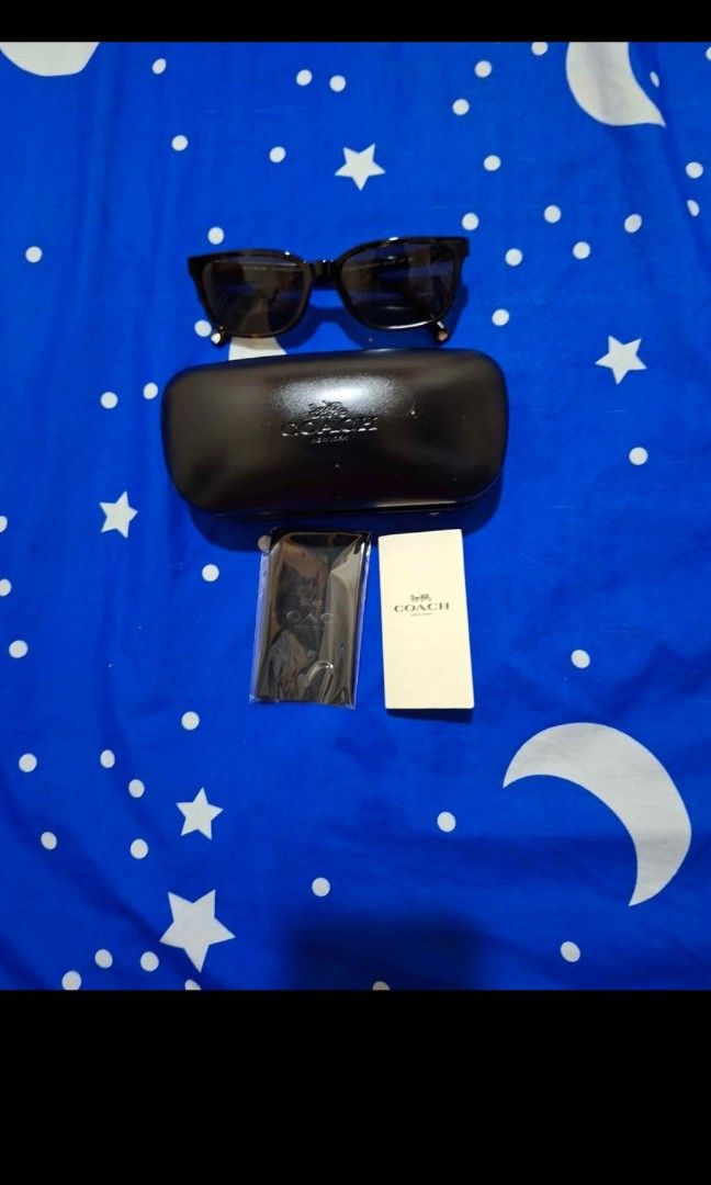 Coach Sunglasses (Category: Sunglasses & Eyewear) located in Paranaque City. Submitted by swiftie198922 (Listing ID 1467847539, Image 1). Description: Authentic Coach Sunglasses Brand new / never used Authentic Coach Complete with original case, cleaning cloth Stylish and versatile design Perfect for everyday wear, travel, or casual outfits Never worn and well-kept Receipt unavailable RFS: Not being used 📍 Meetup: Selected malls within Metro Man
