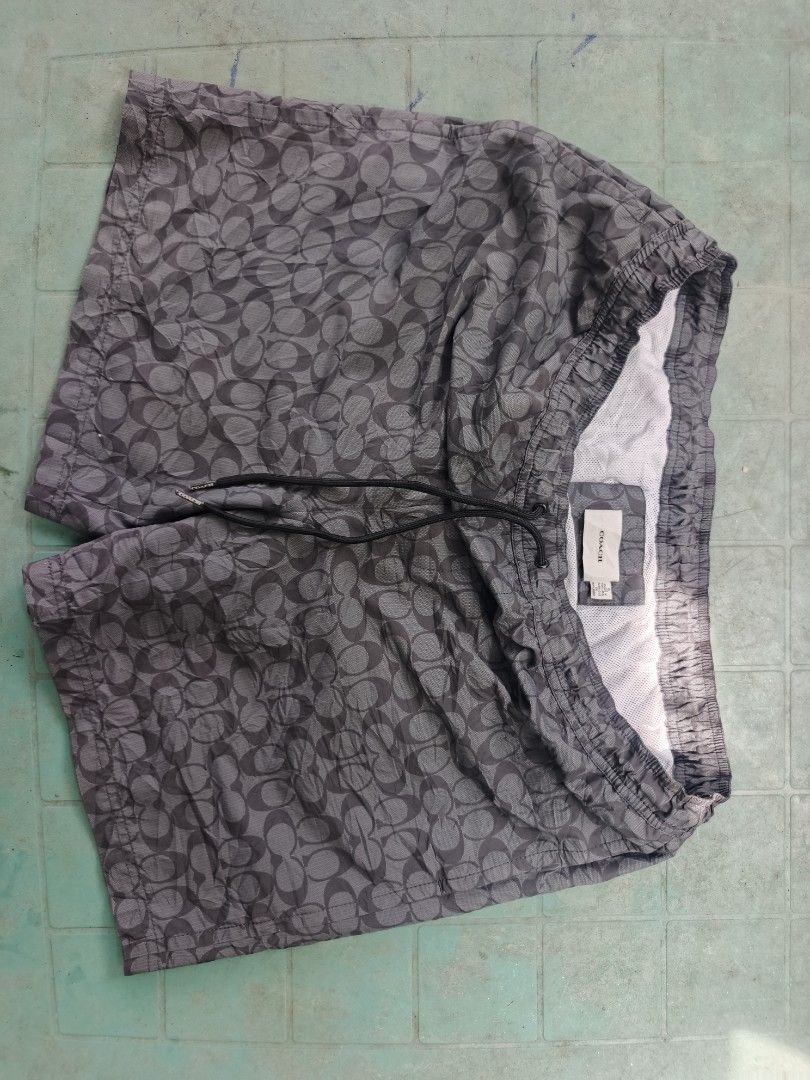 Coach SwimTrunks (Category: Swim Trunks & Board Shorts) located in Lagonglong. Submitted by sadthrifter (Listing ID 1467861037, Image 1). Description: XL on tag flawless.