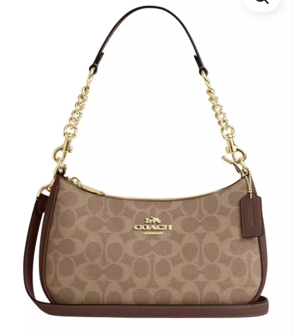Coach Teri (Category: Cross-body Bags) located in San Mateo. Submitted by trendsph_956 (Listing ID 1467840995, Image 1). Description: - Brand: Coach - Material: Signature monogram canvas with brown leather trim - Hardware: Gold-tone details - Closure: Top zip closure with iconic leather hangtag - Strap: Short chain strap with a comfortable leather handle section - Structure: Structured base for an everyday classic look.