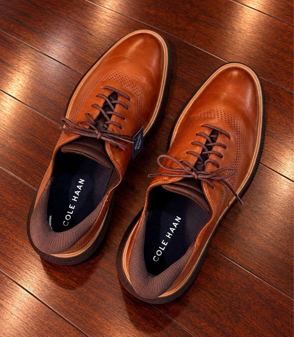 Cole Haan Grand Phase Laser Quick On Oxfords in British Tan-Java (Category: Casual Shoes) located in Paranaque City. Submitted by sole2squeeze (Listing ID 1467899527, Image 3). Description: - Brand: Cole Haan - Color: British Tan-Java - Material: Premium leather with perforated upper - Feature: Quick-on technology for hands-free slip-on functionality - Comfort: Cushioned interior collar and branded insoles - Sole: Dark chunky sole with grip patte