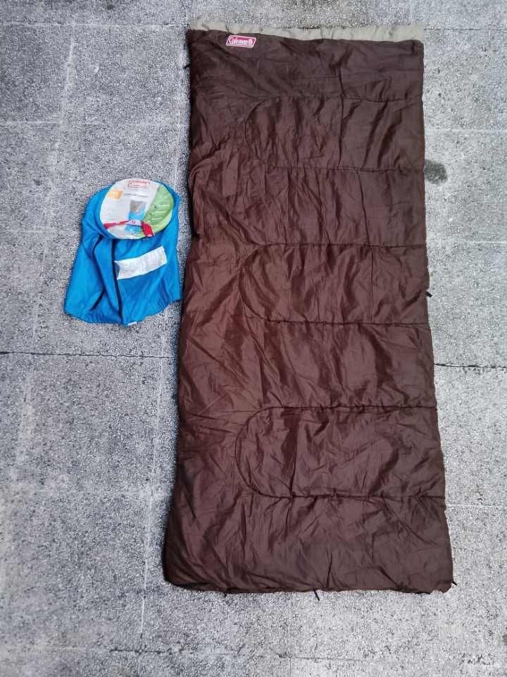 Coleman Sleeping Bag Brown With Carry Bag (Category: Hiking & Camping) located in Quezon City. Submitted by cruz_robert (Listing ID 1468012527, Image 1). Description: - Brand: Coleman - Color: Brown with soft beige interior lining - Versatile design: Fully unzips flat to use as a large blanket or quilt - Portable: Includes a blue drawstring carry bag for easy packing - Convenient: Easy to roll up and pack away quickly, perfect for camping trips o