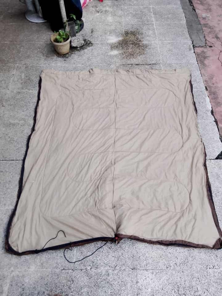 Coleman Sleeping Bag Brown With Carry Bag (Category: Hiking & Camping) located in Quezon City. Submitted by cruz_robert (Listing ID 1468012527, Image 2). Description: - Brand: Coleman - Color: Brown with soft beige interior lining - Versatile design: Fully unzips flat to use as a large blanket or quilt - Portable: Includes a blue drawstring carry bag for easy packing - Convenient: Easy to roll up and pack away quickly, perfect for camping trips o