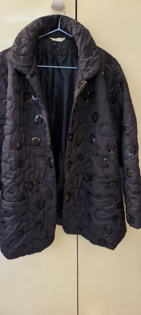 Colorber Black Quilted Jacket with Sequins and Circles (Category: Coats, Jackets and Outerwear) located in Paranaque City. Submitted by lizpretty05 (Listing ID 1467840645, Image 3). Description: - Brand/Style: Colorber black quilted jacket - Design: Stand-up collar, button-front closure, and allover embroidered circle pattern with black sequins - Storage: Two front patch pockets - Comfort: Fully lined interior and warm layer ideal for cooler days