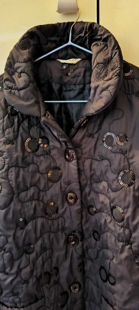 Colorber Black Quilted Jacket with Sequins and Circles (Category: Coats, Jackets and Outerwear) located in Paranaque City. Submitted by lizpretty05 (Listing ID 1467840645, Image 2). Description: - Brand/Style: Colorber black quilted jacket - Design: Stand-up collar, button-front closure, and allover embroidered circle pattern with black sequins - Storage: Two front patch pockets - Comfort: Fully lined interior and warm layer ideal for cooler days