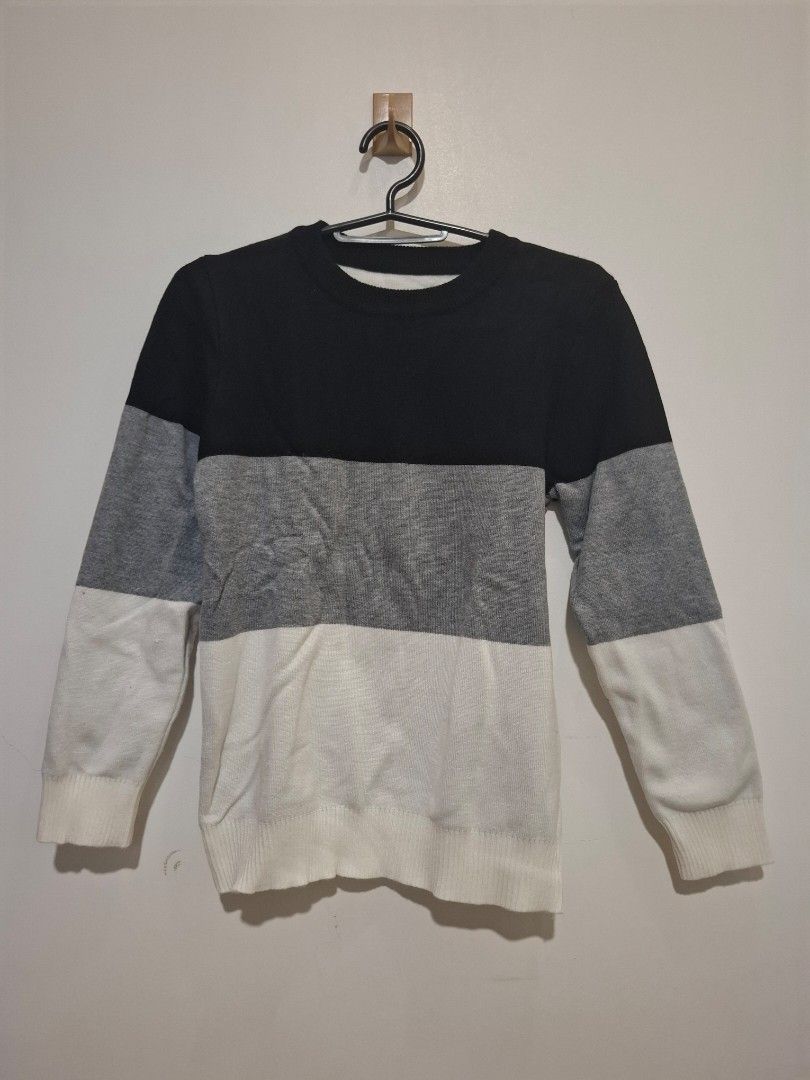 Colorblock Knit Sweater Black Grey White (Category: Babies & Kids Fashion) located in Imus. Submitted by maggieforce (Listing ID 1467935043, Image 1). Description: Long sleeve knit sweater with a colorblock design. Horizontal stripes in black, grey, and white. Ribbed crewneck, cuffs, and hem. Soft fabric, comfortable fit. Great for cooler weather layering. Easy to match with jeans or casual trousers. Clean condition, ready to wear..