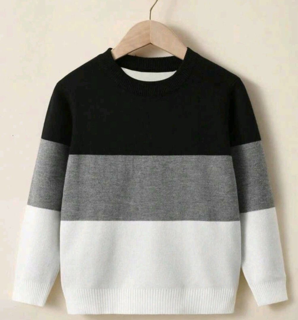 Colorblock Knit Sweater Black Grey White (Category: Babies & Kids Fashion) located in Imus. Submitted by maggieforce (Listing ID 1467935043, Image 3). Description: Long sleeve knit sweater with a colorblock design. Horizontal stripes in black, grey, and white. Ribbed crewneck, cuffs, and hem. Soft fabric, comfortable fit. Great for cooler weather layering. Easy to match with jeans or casual trousers. Clean condition, ready to wear..