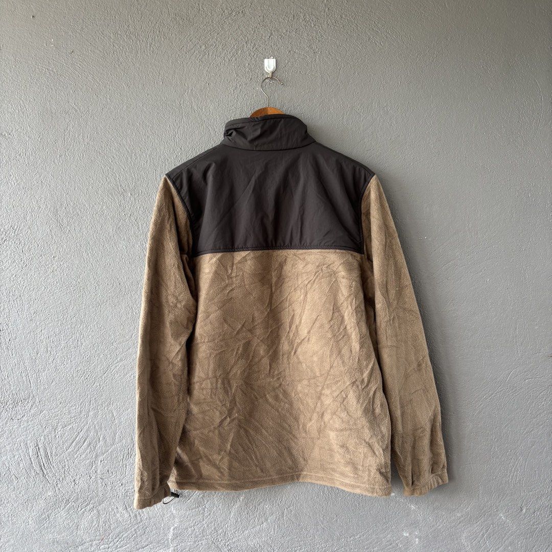 Columbia fleece jacket (Category: Coats, Jackets and Outerwear) located in San Fernando. Submitted by diff.thr1ft (Listing ID 1467864715, Image 2). Description: - Brand: Columbia Sportswear Company - Type: Full-zip fleece jacket / outerwear - Size: Large (Made in Indonesia) - Color: Brown body with dark grey colorblock upper and trim - Features: Zippered chest pocket with logo embroidery, two side hand pockets, high collar, and adjustable hem dra