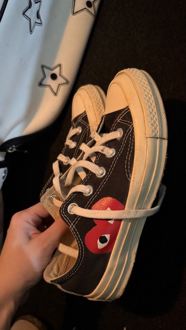 COMME des GARÇONS Play x Converse Chuck 70 Low Black (Category: Sneakers) located in Manila. Submitted by felicavestis (Listing ID 1467978982, Image 2). Description: - Brand: Comme des Garçons Play x Converse - Style: Black canvas low-top sneakers - Details: Signature red heart with eyes graphic, white rubber toe cap, midsole, and contrast heel stripe - Condition: Soles show minor wear from previous use, uppers are clean - Perfect streetwear stap