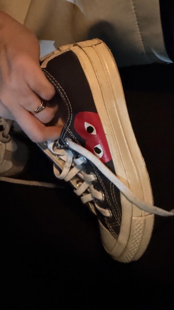 COMME des GARÇONS Play x Converse Chuck 70 Low Black (Category: Sneakers) located in Manila. Submitted by felicavestis (Listing ID 1467978982, Image 3). Description: - Brand: Comme des Garçons Play x Converse - Style: Black canvas low-top sneakers - Details: Signature red heart with eyes graphic, white rubber toe cap, midsole, and contrast heel stripe - Condition: Soles show minor wear from previous use, uppers are clean - Perfect streetwear stap